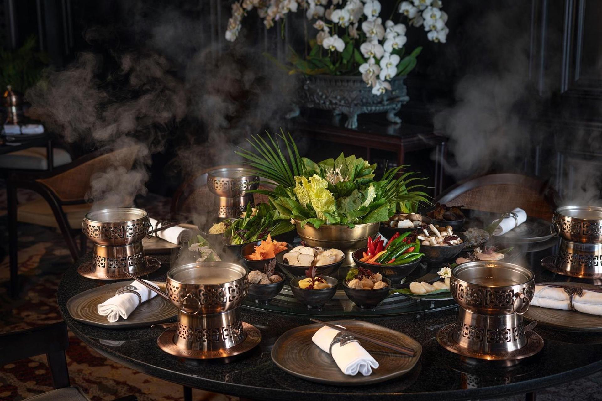 The Apurva Kempinski Bali Nusa Dua  Esterno foto A table set for a meal at the restaurant